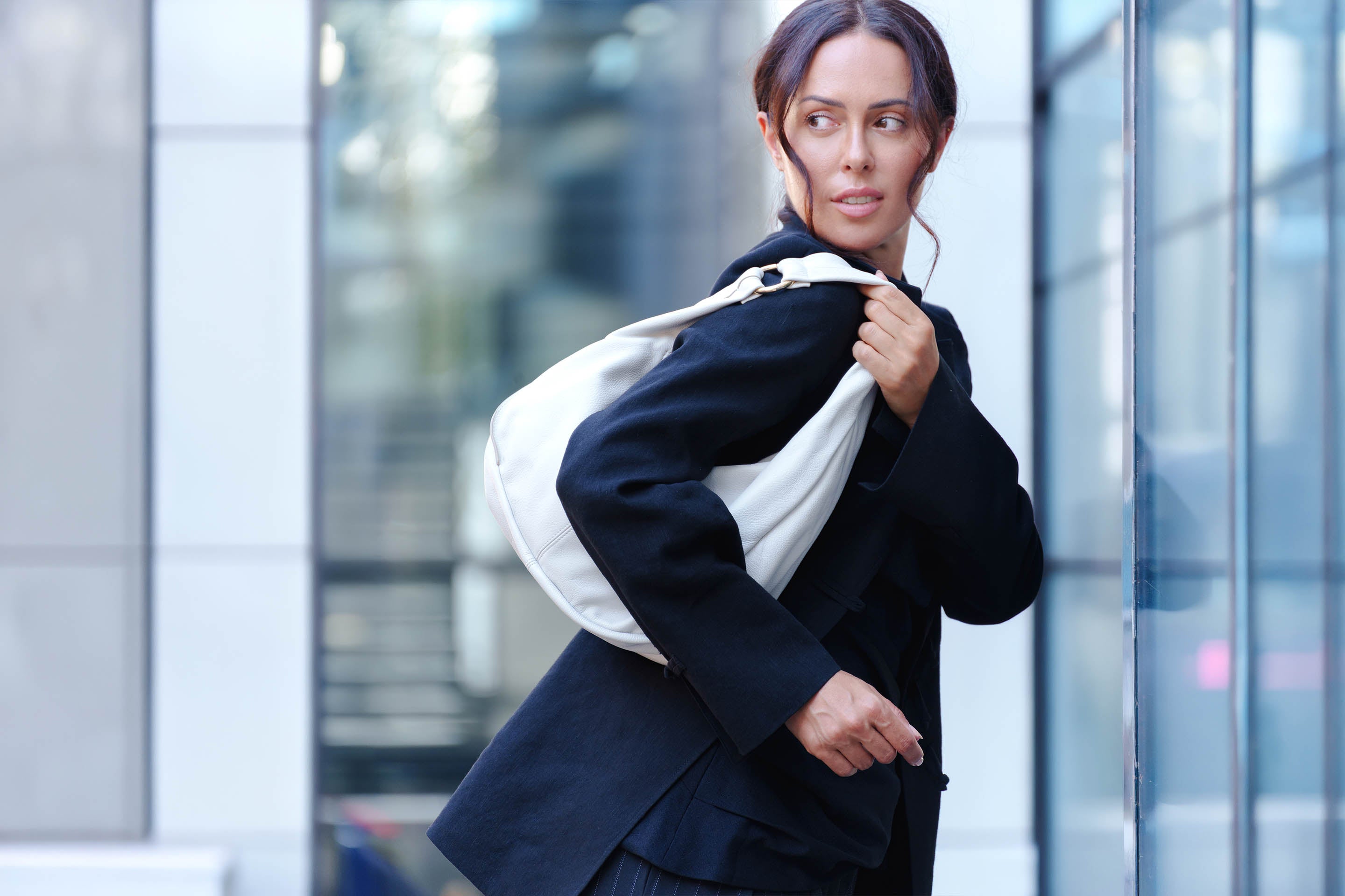 Soft but Structured. Lightweight leather handbags, handcrafted to